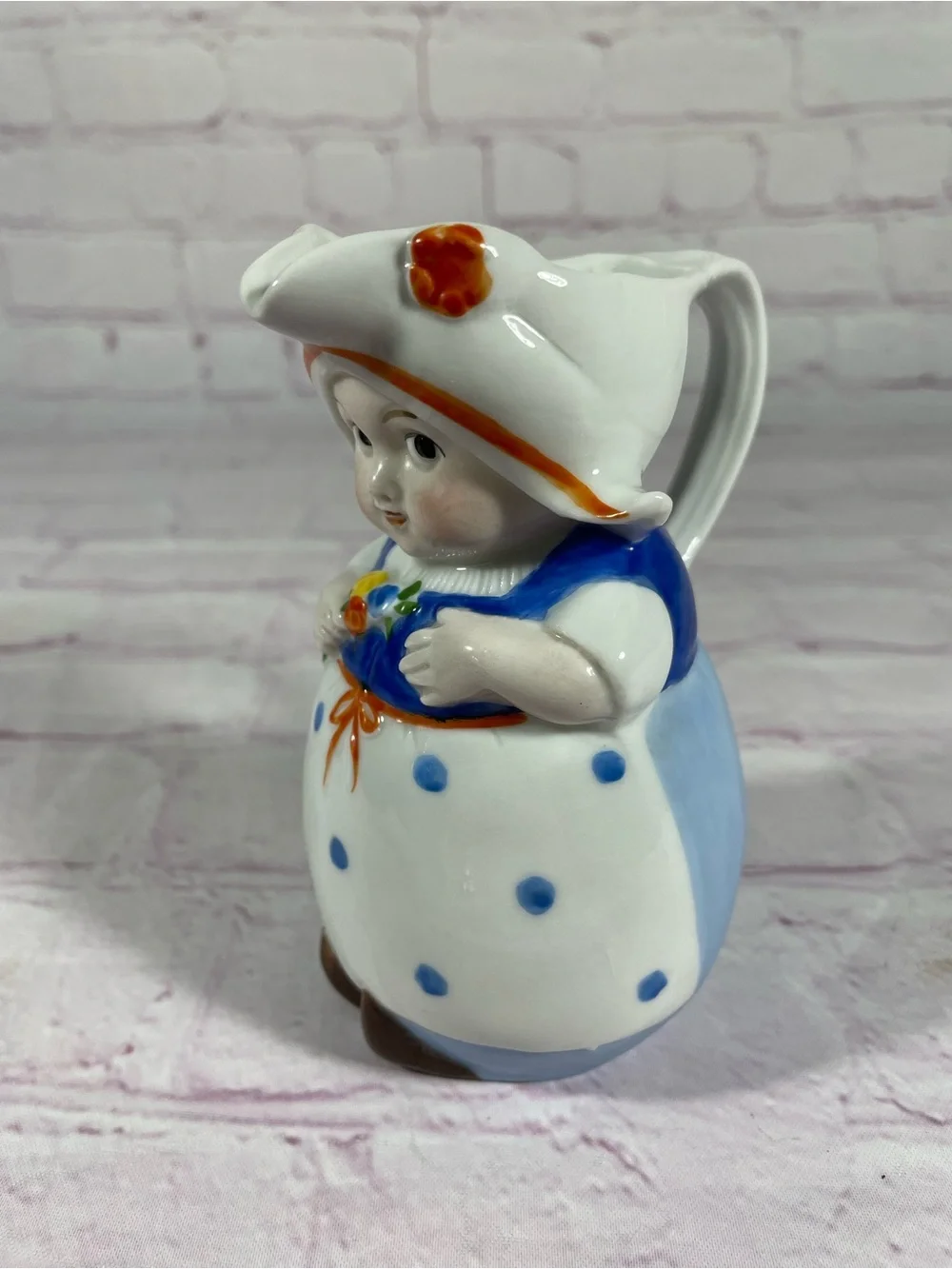 Vintage Dutch Girl Holding Flowers Hand Painted Ceramic Creamer Pitcher Germany